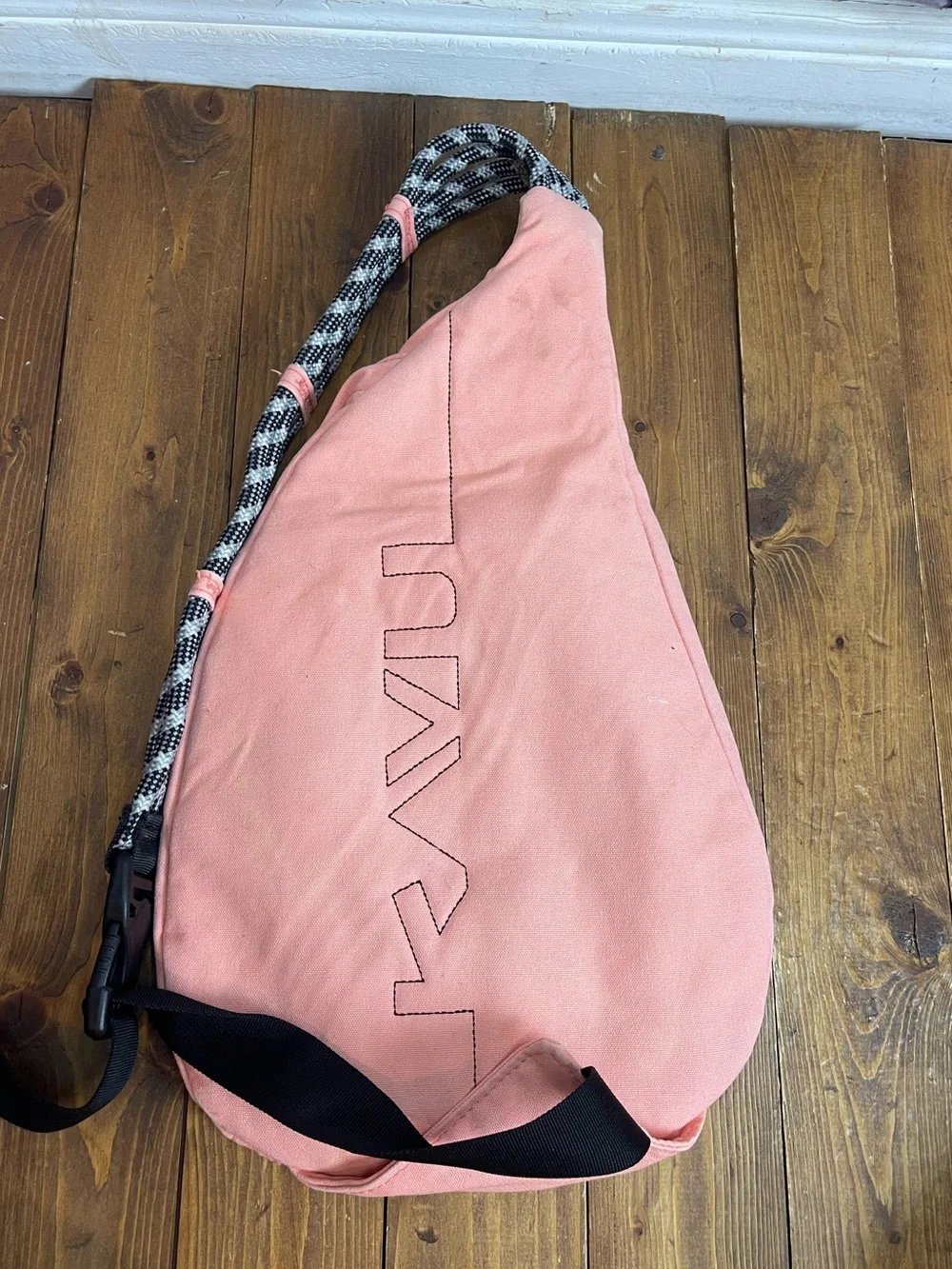Kavu sling backpack peach color